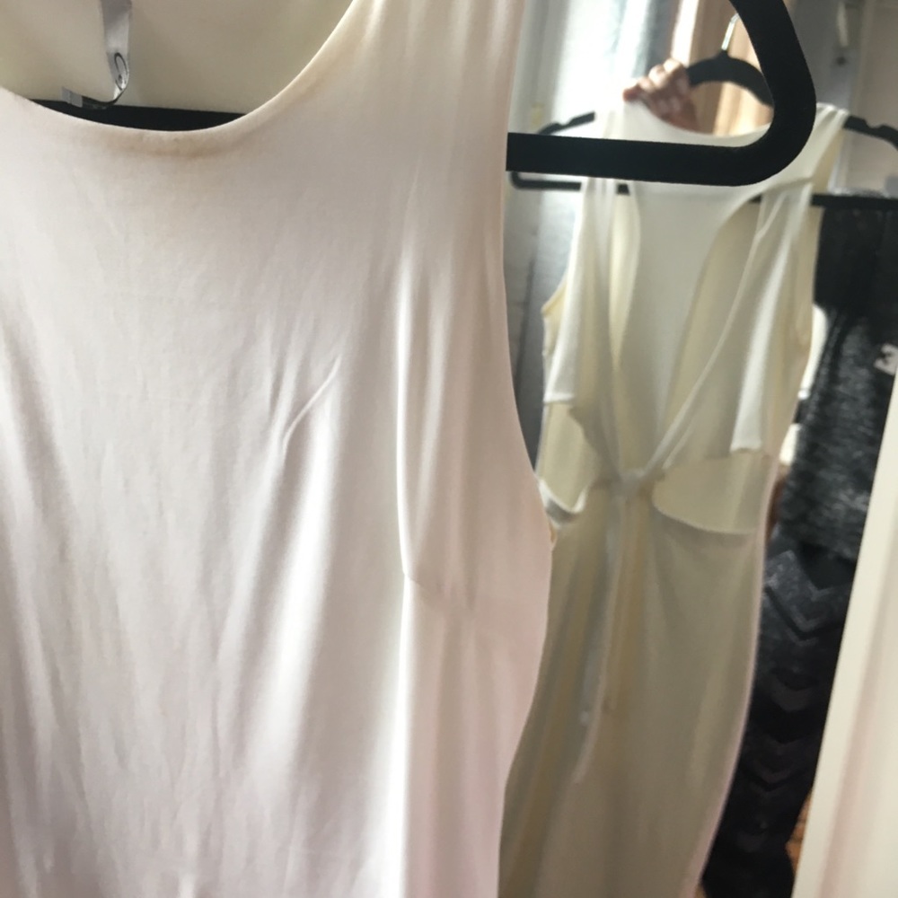 White dress with bow on the back.